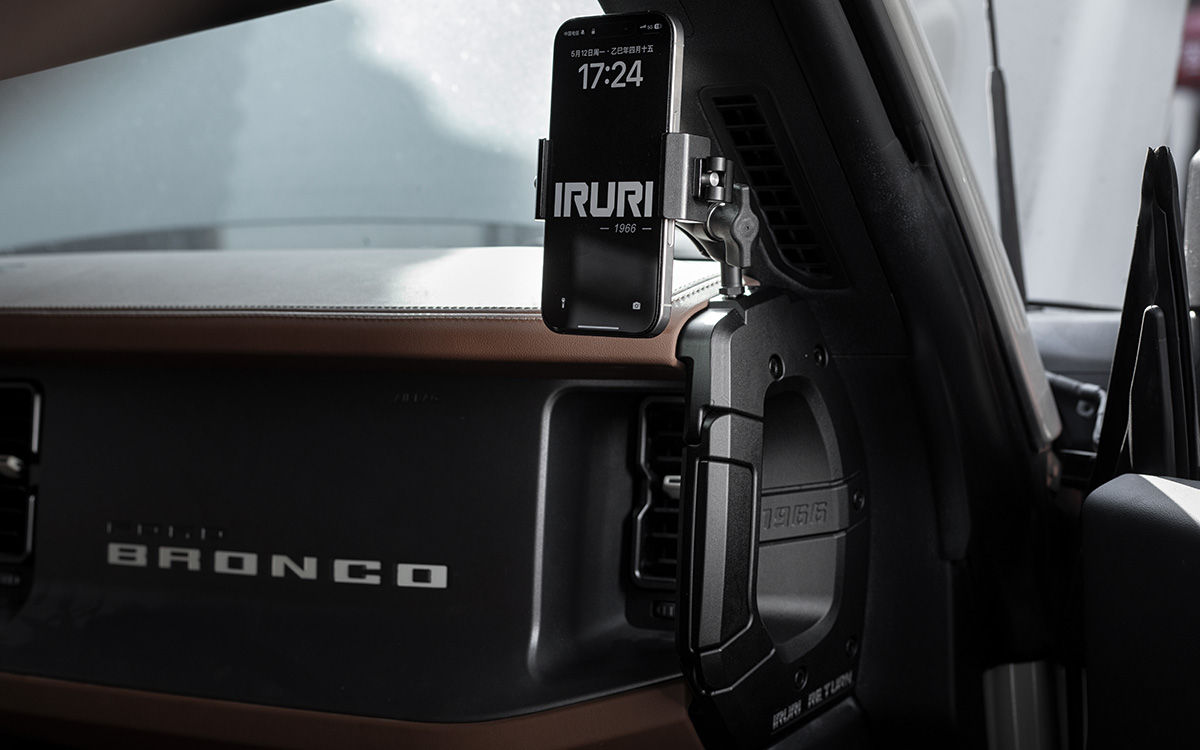 A pair of black, textured IRURI Center Console Side Grab Handles for the Ford Bronco, featuring the '1966' and 'IRURI RETURN' branding, displayed as an interior upgrade accessory.