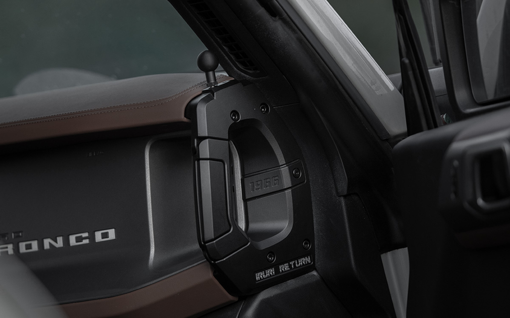 A pair of black, textured IRURI Center Console Side Grab Handles for the Ford Bronco, featuring the '1966' and 'IRURI RETURN' branding, displayed as an interior upgrade accessory.