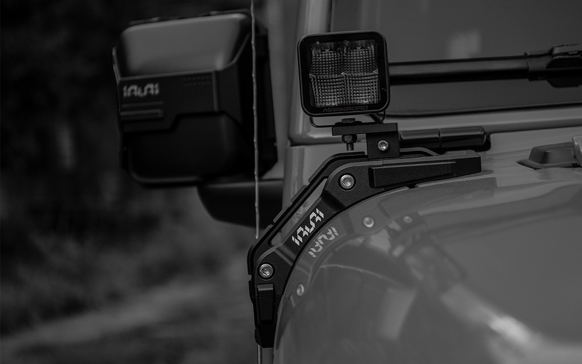 Upgrade night trails with the IRURI Origin A-Pillar Light Mount for Jeep JL & 4xe. No-drill install, CNC aluminum durability, and MIL-SPEC strength.