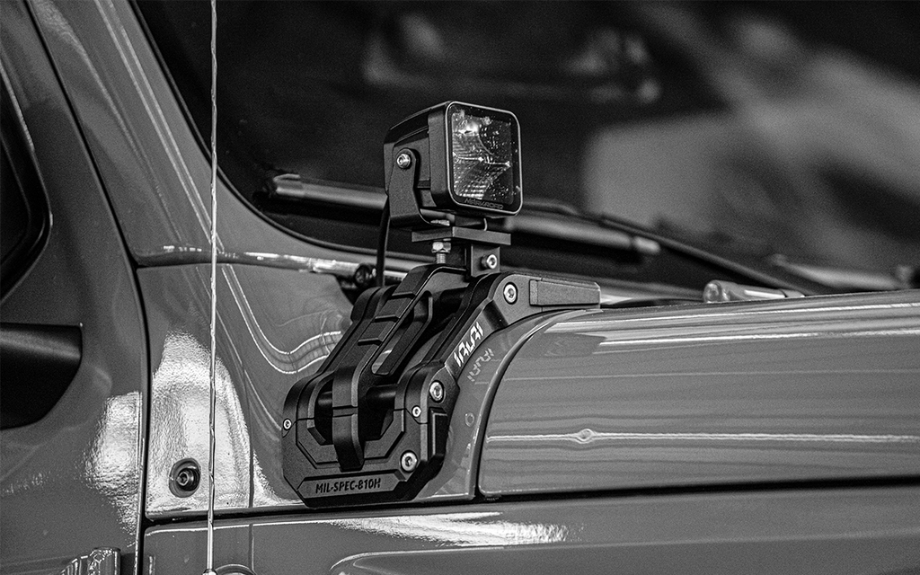 Upgrade night trails with the IRURI Origin A-Pillar Light Mount for Jeep JL & 4xe. No-drill install, CNC aluminum durability, and MIL-SPEC strength.