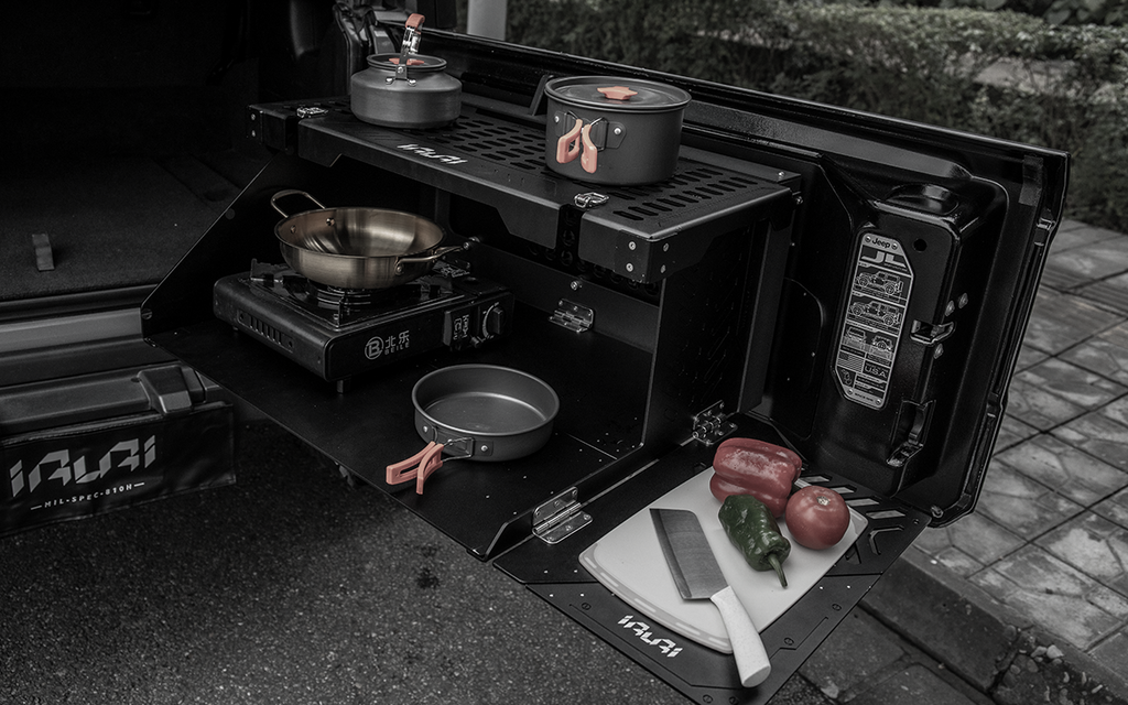 Upgrade your rig with the IRURI Rear Tailgate Multi-Function Platform. A tough, versatile workspace for cooking and gear organization on any overland trip.