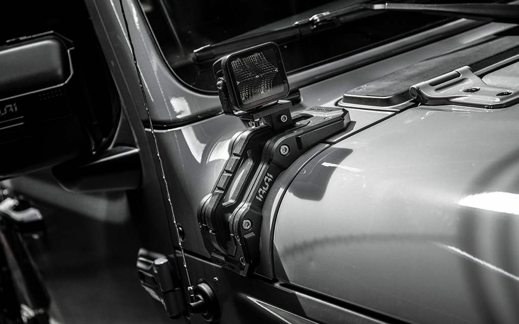 Upgrade night trails with the IRURI Origin A-Pillar Light Mount for Jeep JL & 4xe. No-drill install, CNC aluminum durability, and MIL-SPEC strength.