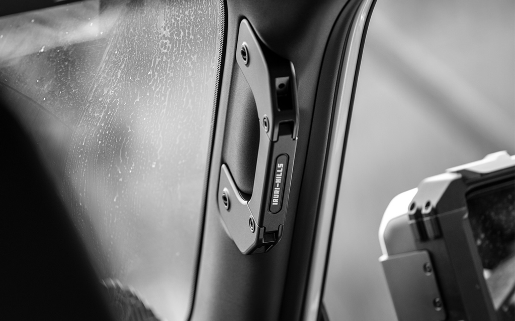 Upgrade your LC250 with IRURI A-Pillar Grab Handles. CNC Al-Mg alloy, low-profile design, and 6 expansion ports for gear mounting.