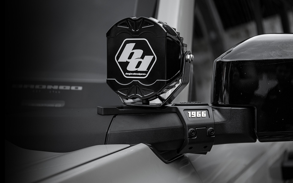 No-drill overland upgrade. 2021-2026 Ford Bronco A-pillar ditch light mounts. Heavy-duty brackets for LED pod lights. Wind-noise reducing tactical design.