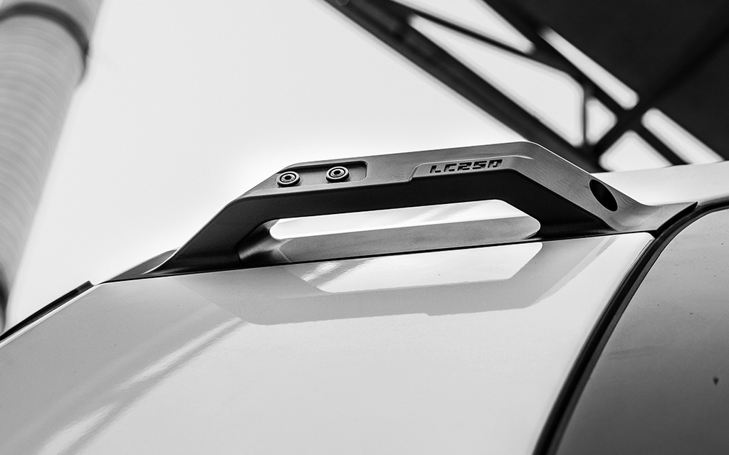 Equip your LC250 with IRURI D-Pillar Grab Handles. CNC Al-Mg alloy, rigid bolt-on mount, silent & strong for safe roof access.