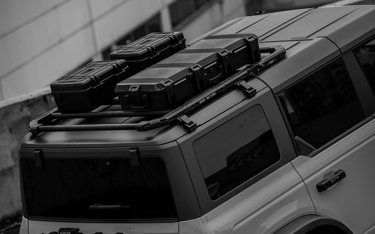 Ultimate overlanding utility. 2021-2026 Ford Bronco tactical folding roof rack platform. Heavy-duty design with noise-reducing folding mechanism. No-drill fit.