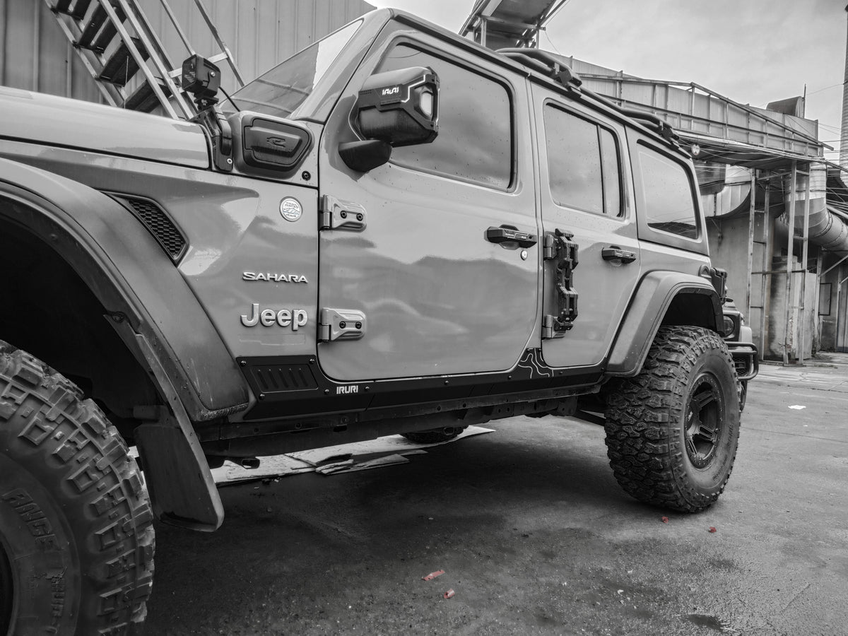 Enhance your Jeep Wrangler with our rugged, custom-molded side armor. Get ultimate off-road protection, a sleek "Black Knight" aesthetic, and a perfect fit.